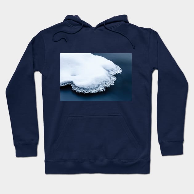 Ice, snow and moving water Hoodie by Jukka Heilimo